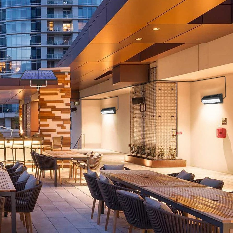 Aurinkoseinävalo, jossa on kaksinkertainen pää ja erillinen paneeli